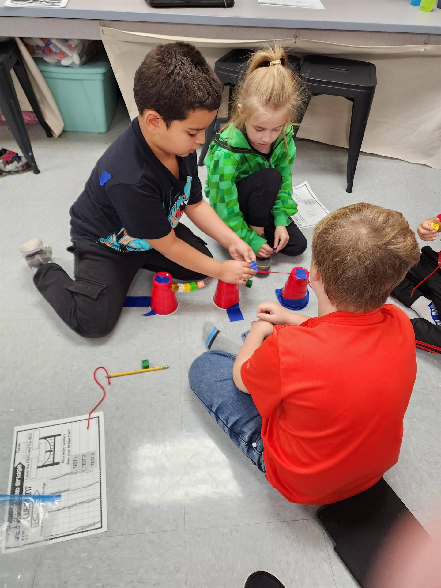 Mrs. Liston’s 1st graders built spider web bridges