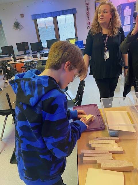 Students practicing woodshop